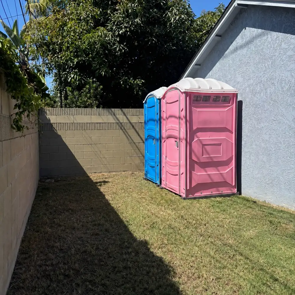 Porta potty placed beside a house during repairs