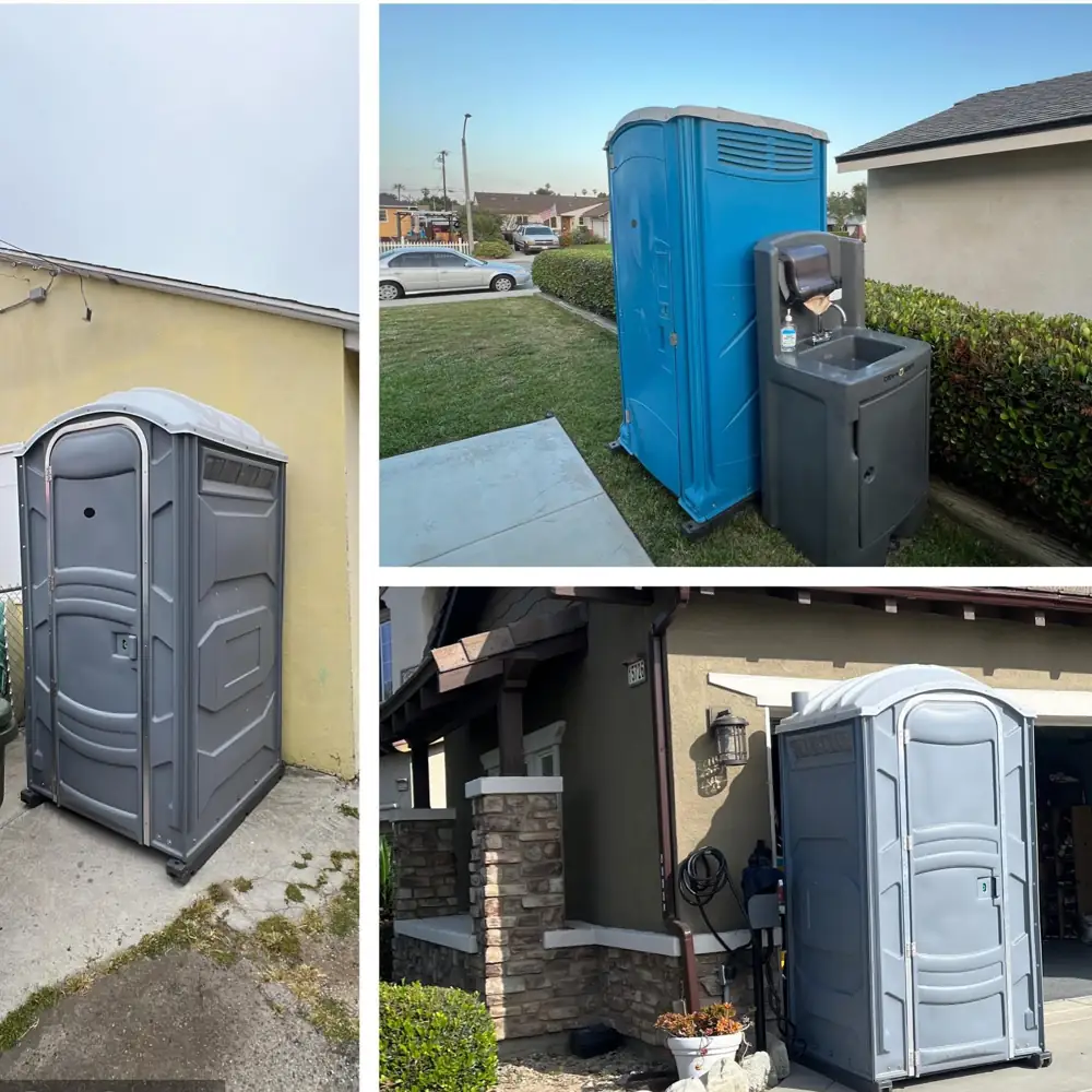Porta potties set on firm ground beside a home