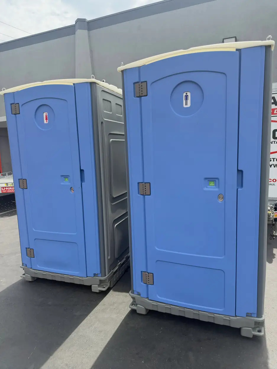 Two Sean Rental Works standard porta potties